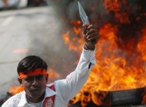 An activist from the hardline Hindu group Bajrang Dal attends a protest rally in Lucknow